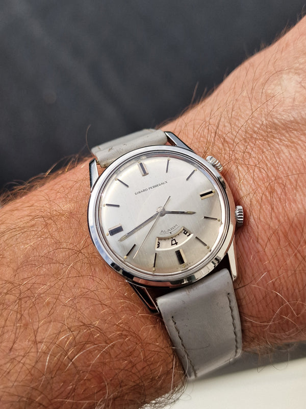 (RESERVED) Girard-Perregaux rare swiss Alarm classic wristwatch in Stainless Steel Circa 1960s 35mm