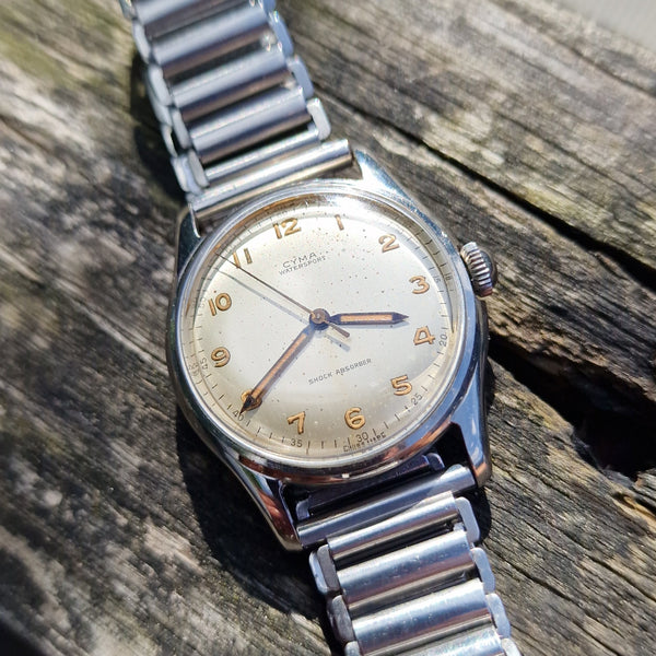 1950s Cyma Watersport steel wristwatch original all-Arabic military dial on rare GF Bonklip bracelet