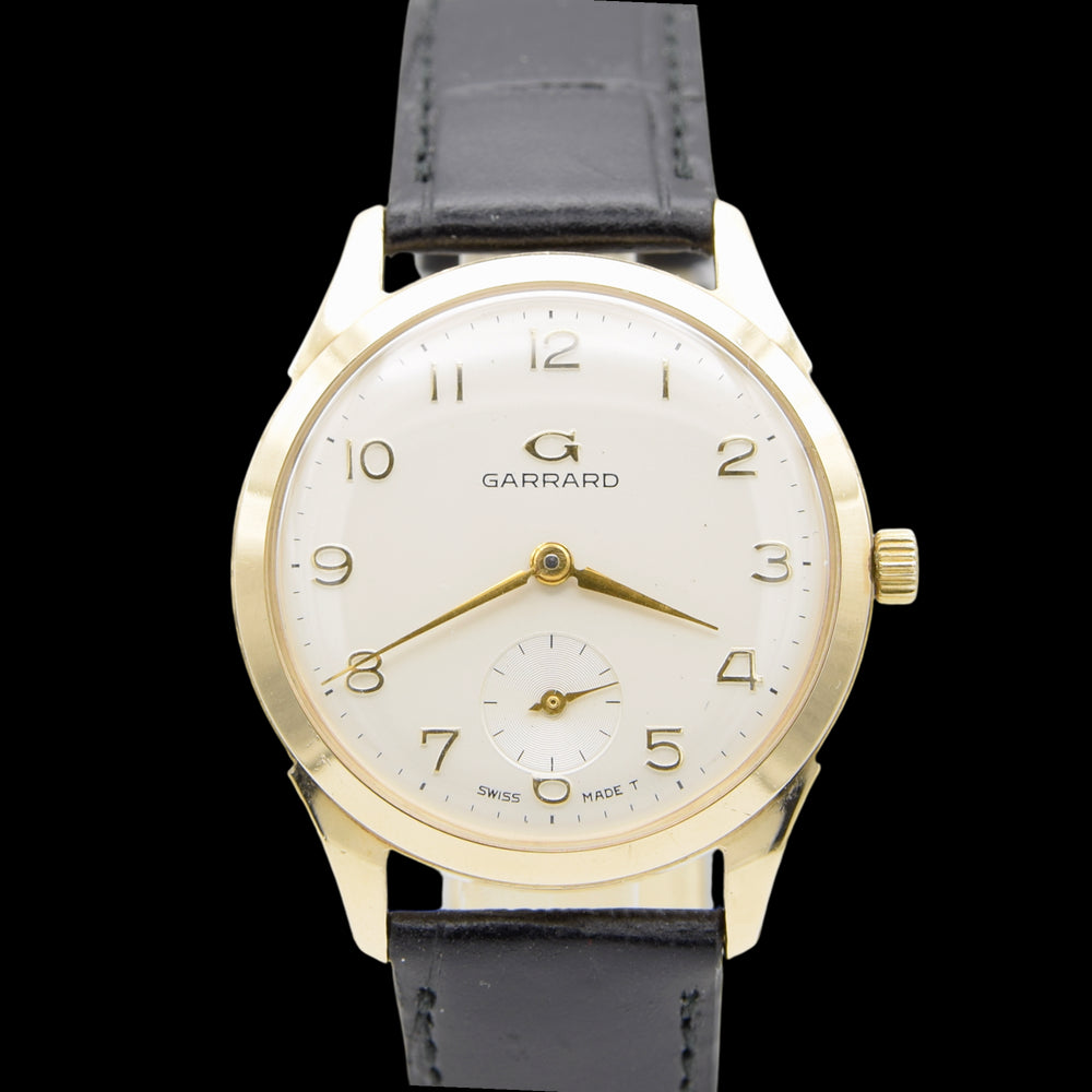 1964 Garrard of London Wristwatch in solid 9ct Gold with all Arabic dial and Original Box