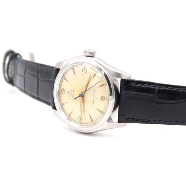 1948 Tudor Oyster Ref 7804 steel watch with original explorer-style dial, 34mm, patent Oyster crown