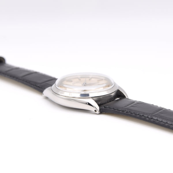 1965 Rolex Oyster Perpetual chronometer certified Model 1002 with satin silvered Dial in Stainless Steel