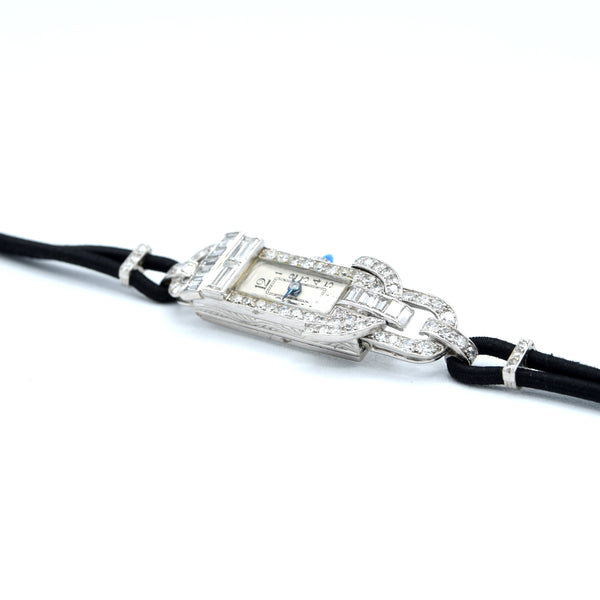 1930s Ladies art deco exquisite platinum and diamond cocktail watch Goldsmiths & Silversmiths Articulated Lugs