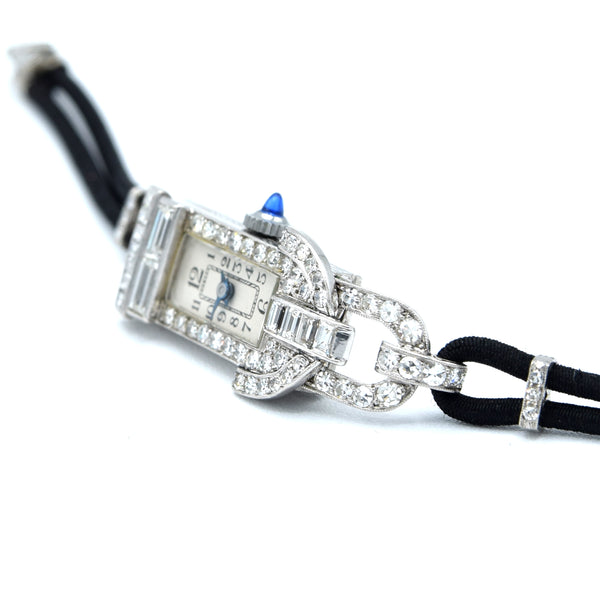 1930s Ladies art deco exquisite platinum and diamond cocktail watch Goldsmiths & Silversmiths Articulated Lugs