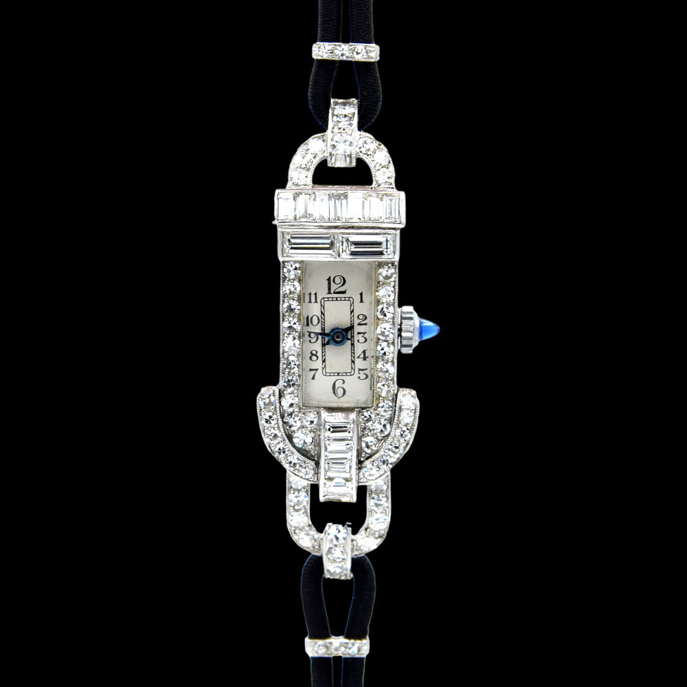 1930s Ladies art deco exquisite platinum and diamond cocktail watch Goldsmiths & Silversmiths Articulated Lugs