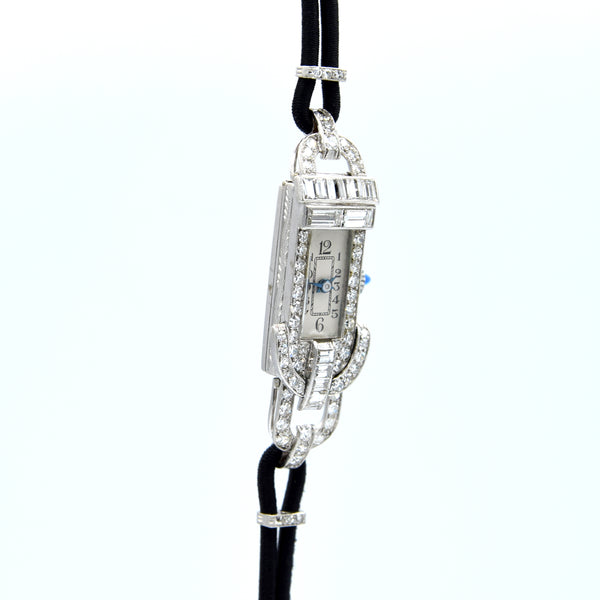 1930s Ladies art deco exquisite platinum and diamond cocktail watch Goldsmiths & Silversmiths Articulated Lugs