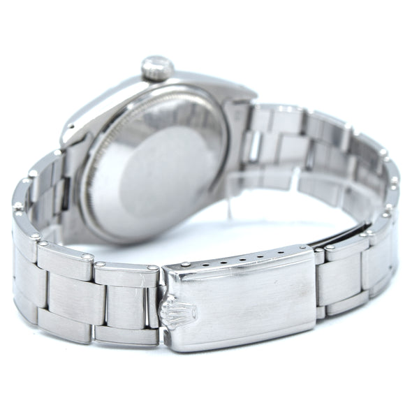 1960 Rolex Oyster Perpetual Date Model 1500 with black Dial in Stainless Steel on Oyster Bracelet