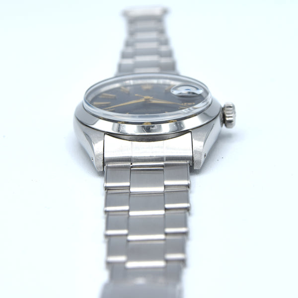 1960 Rolex Oyster Perpetual Date Model 1500 with black Dial in Stainless Steel on Oyster Bracelet