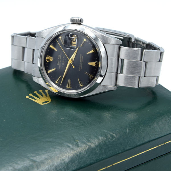 1960 Rolex Oyster Perpetual Date Model 1500 with black Dial in Stainless Steel on Oyster Bracelet