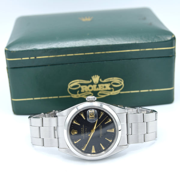 1960 Rolex Oyster Perpetual Date Model 1500 with black Dial in Stainless Steel on Oyster Bracelet