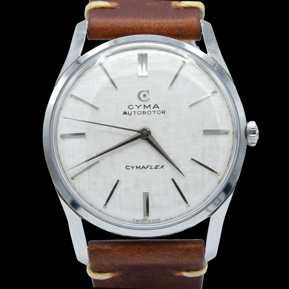 1960s larger Cyma autorotor Cymaflex Wristwatch with fabulous linen effect dial