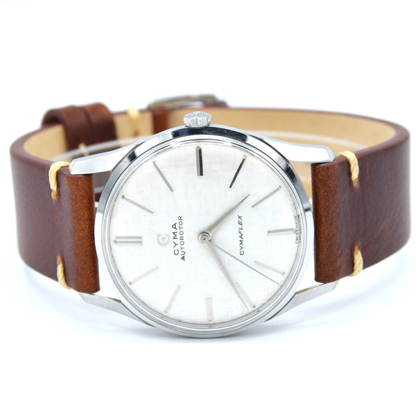 1960s larger Cyma autorotor Cymaflex Wristwatch with fabulous linen effect dial