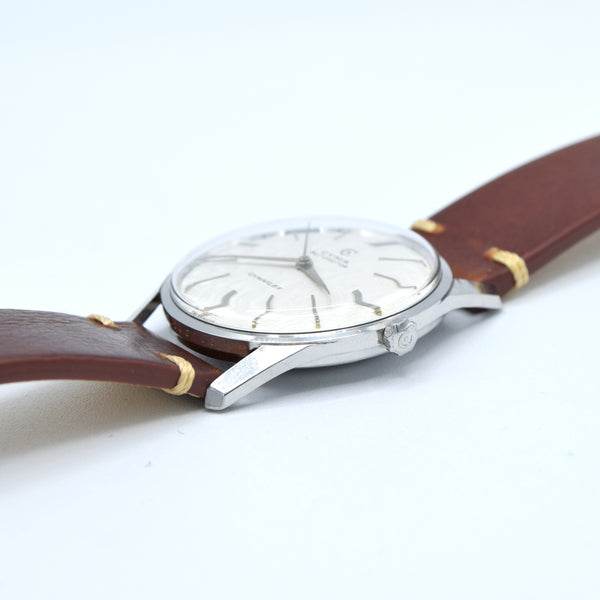 1960s larger Cyma autorotor Cymaflex Wristwatch with fabulous linen effect dial