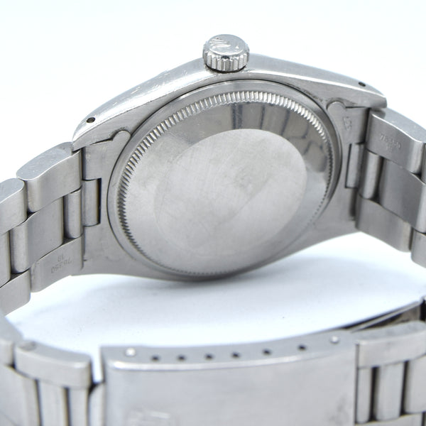 1978 Rolex Oyster Perpetual Date Model 1500 with mint Champagne dial in Stainless Steel on oyster Bracelet
