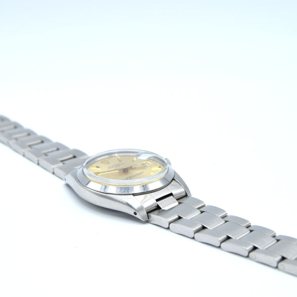 1978 Rolex Oyster Perpetual Date Model 1500 with mint Champagne dial in Stainless Steel on oyster Bracelet