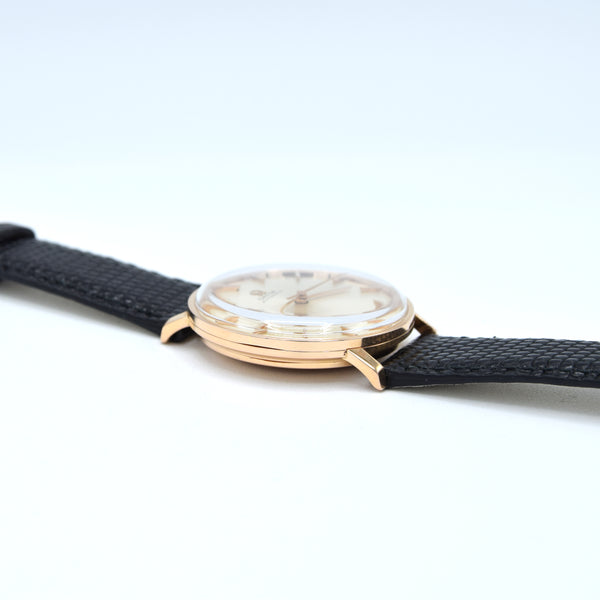 1965 Omega elegant and classic Automatic wristwatch in solid 18k pink Gold cal 552