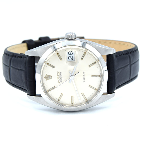 1961 Rolex Oysterdate Precision 6694 Wristwatch with baton Markers in Stainless Steel with raised Rolex original dial