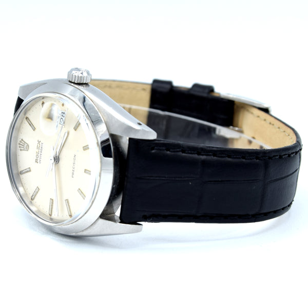 1961 Rolex Oysterdate Precision 6694 Wristwatch with baton Markers in Stainless Steel with raised Rolex original dial