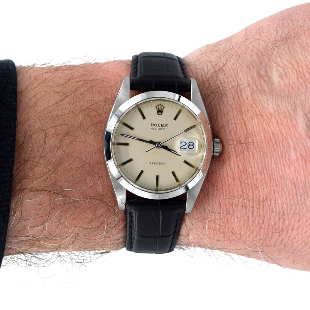 1961 Rolex Oysterdate Precision 6694 Wristwatch with baton Markers in Stainless Steel with raised Rolex original dial