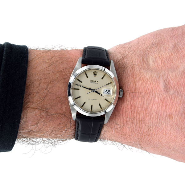 1961 Rolex Oysterdate Precision 6694 Wristwatch with baton Markers in Stainless Steel with raised Rolex original dial