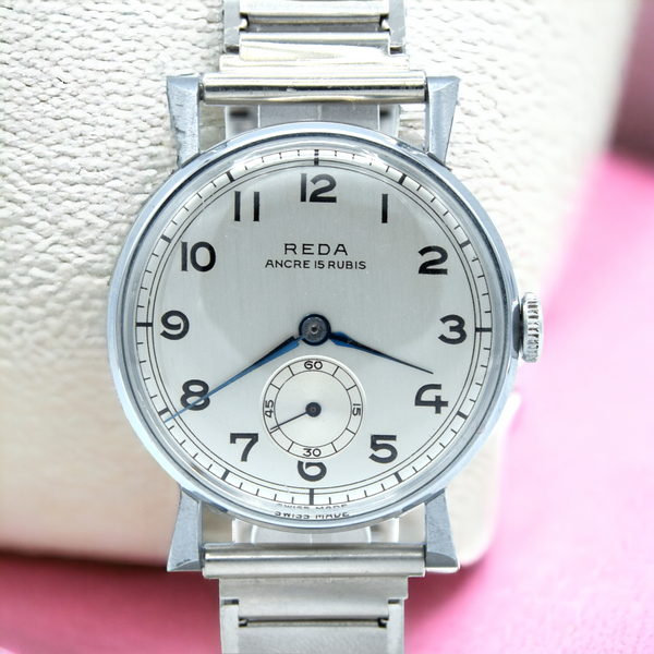 1940s New old stock unused Reda swiss wristwatch with fancy lugs on unusual patented Swiss bracelet