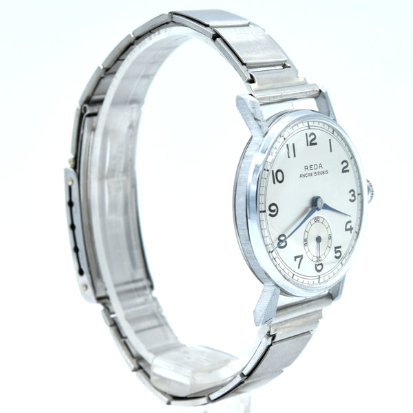 1940s New old stock unused Reda swiss wristwatch with fancy lugs on unusual patented Swiss bracelet