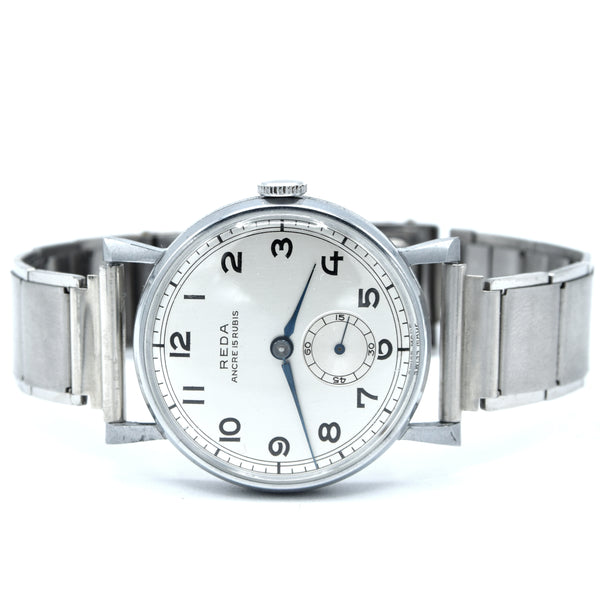 1940s New old stock unused Reda swiss wristwatch with fancy lugs on unusual patented Swiss bracelet