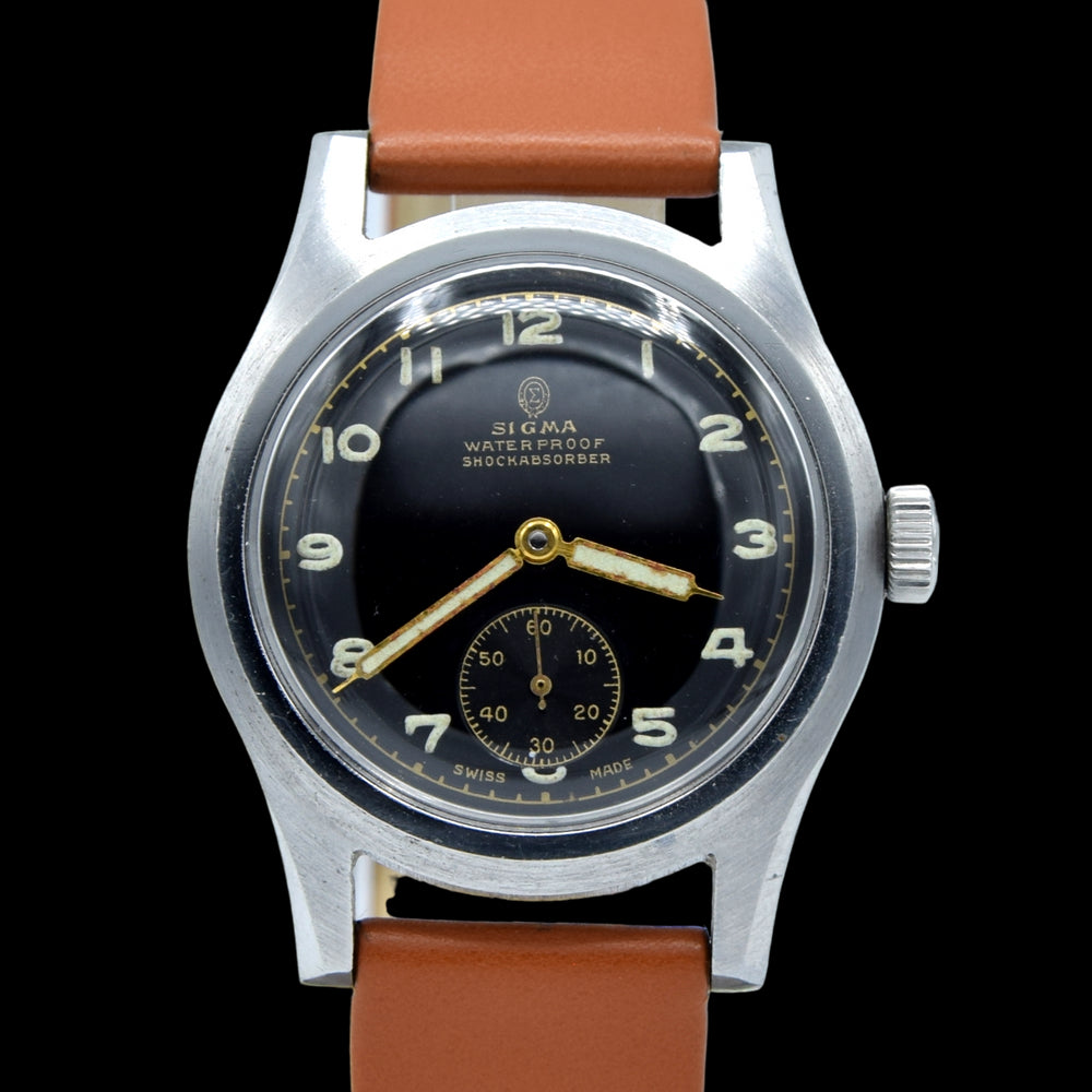 1940s Swiss Sigma military style wristwatch with stunning original gloss black Arabic dial