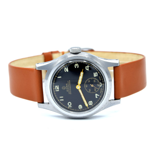 1940s Swiss Sigma military style wristwatch with stunning original gloss black Arabic dial