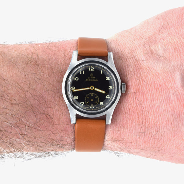 1940s Swiss Sigma military style wristwatch with stunning original gloss black Arabic dial