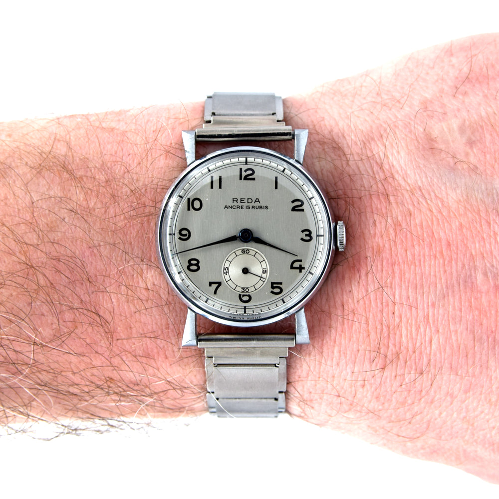 1940s New old stock unused Reda swiss wristwatch with fancy lugs on unusual patented Swiss bracelet