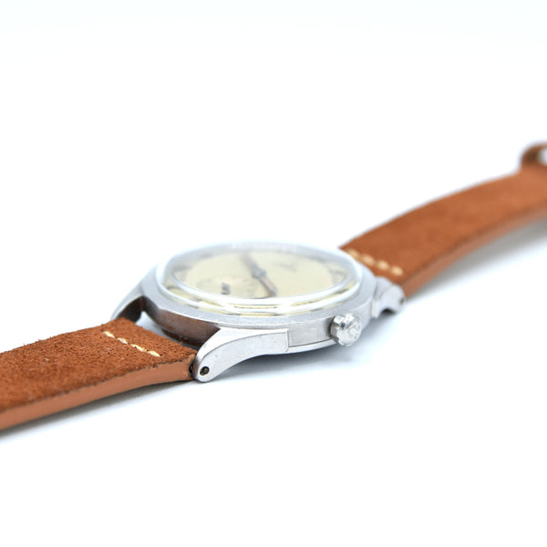 1945 Omega Bumper Automatic Wristwatch with Perfect Patina Dial and Arabic Numerals Model 2374 in Stainless Steel