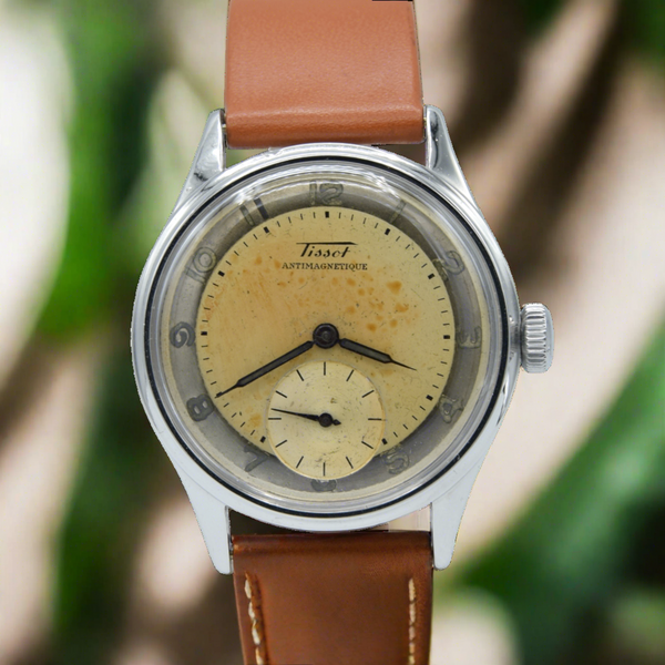 1947 Tissot Antimagnetique Manual Wind Wristwatch Model 6445-5 with Original Two Tone Radial Arabic Numeral Dial in steel