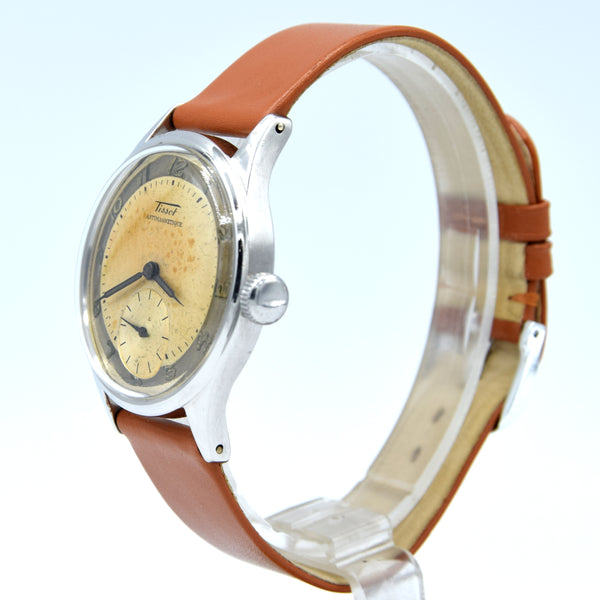 1947 Tissot Antimagnetique Manual Wind Wristwatch Model 6445-5 with Original Two Tone Radial Arabic Numeral Dial in steel