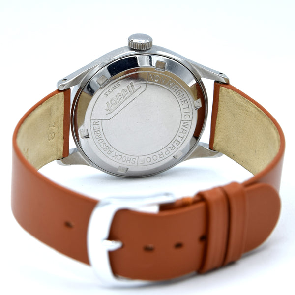 1947 Tissot Antimagnetique Manual Wind Wristwatch Model 6445-5 with Original Two Tone Radial Arabic Numeral Dial in steel