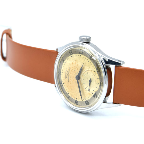 1947 Tissot Anti-Magnetic Manual Wind Wristwatch Model 6445-5 with Original Two Tone Radial Arabic Numeral Dial in steel