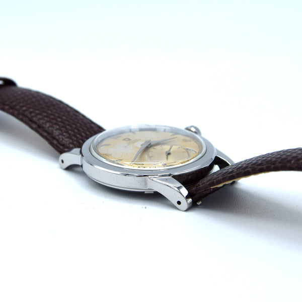 (RESERVED) 1950 Omega Automatic Bumper with Deco Arabic & Spearhead markers Model 2576 in Stainless Steel