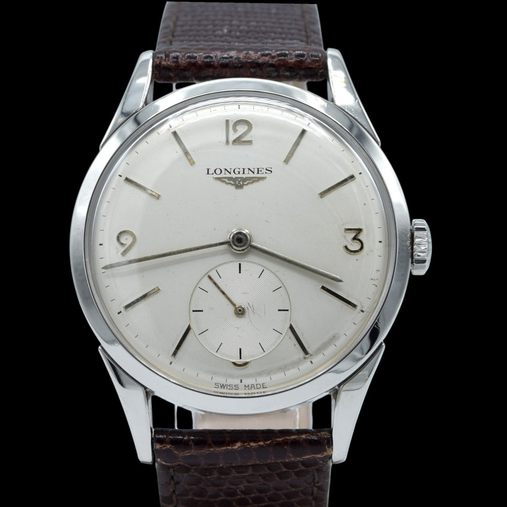 1959 Longines classic Dress Watch with Mixed line and Arabic Numerals Model 6666 with Archive extract