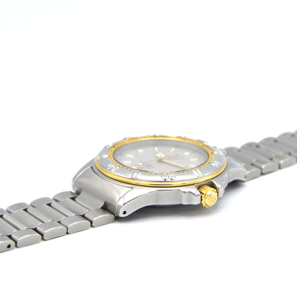 1990s TAG Heuer Date Automatic 4000 Series - 695.706K 38mm Stainless Steel on Flip-Lock Bracelet