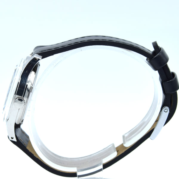 1960s Technos Mid-Size Steel Manual Wind On Leather Strap With Original Signed Buckle – Silver Sunburst Dial