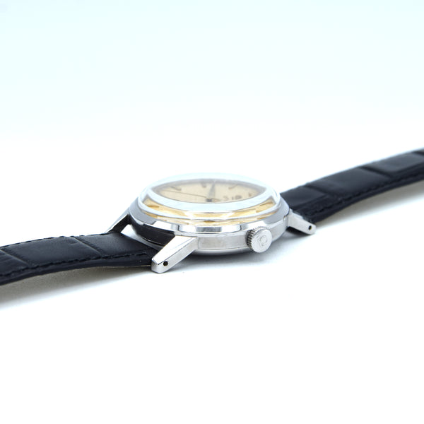 1952 Omega Ref. 2496 Steel Manual Wind Watch – Cal. 283 – Original Eggshell Patina Dial, Facet Lugs & Signed Crown