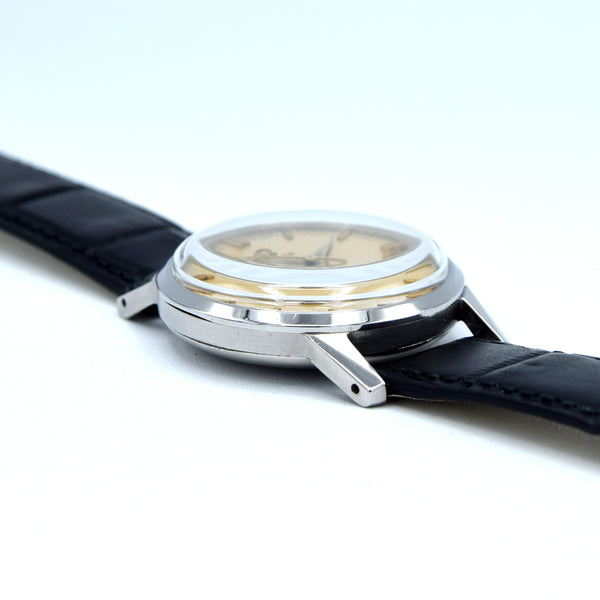 1952 Omega Ref. 2496 Steel Manual Wind Watch – Cal. 283 – Original Eggshell Patina Dial, Facet Lugs & Signed Crown