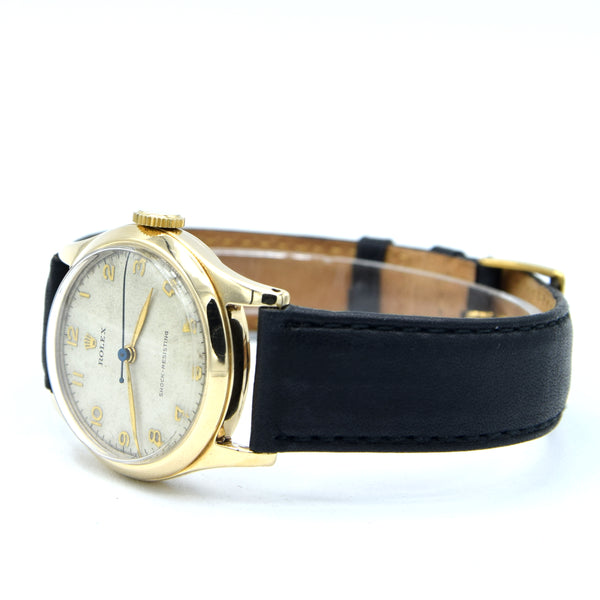 1953 Rolex Classic Dress Wristwatch in Solid 9ct Gold with Patina Arabic Dial in 30mm Unisex