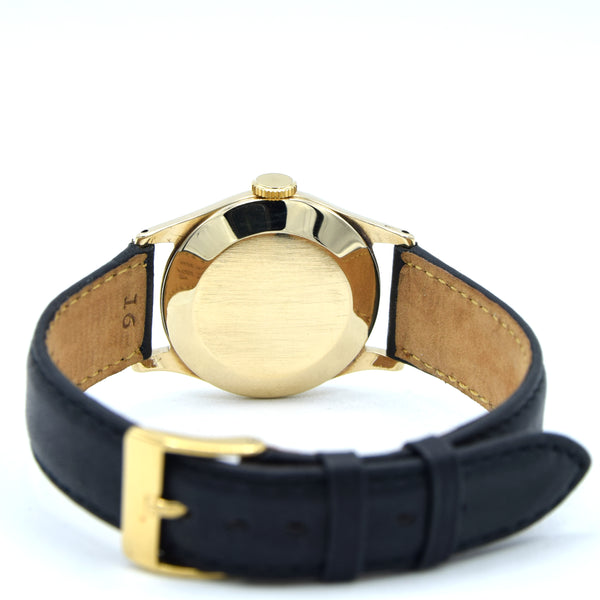 1953 Rolex Classic Dress Wristwatch in Solid 9ct Gold with Patina Arabic Dial in 30mm Unisex