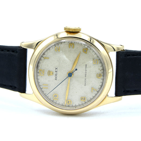 1953 Rolex Classic Dress Wristwatch in Solid 9ct Gold with Patina Arabic Dial in 30mm Unisex