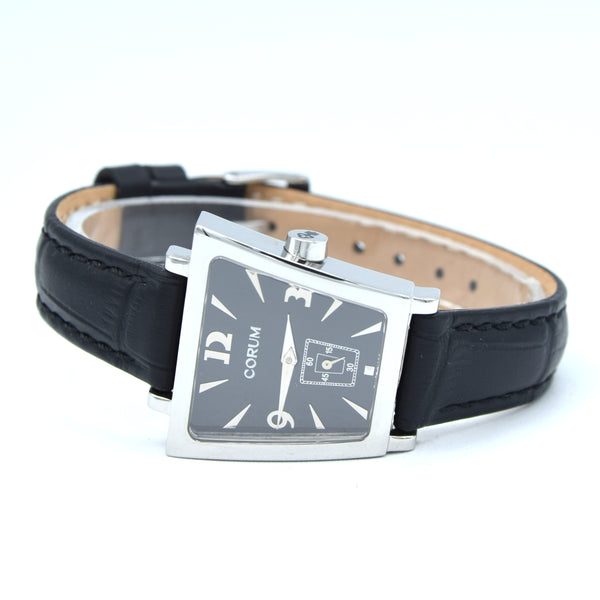 Corum Trapeze ladies ref. 105.404.20 stainless steel quartz watch, black dial with original buckle