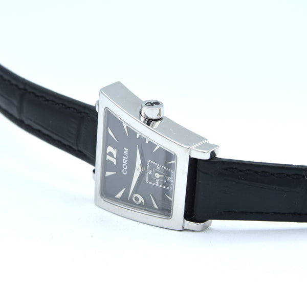 Corum Trapeze ladies ref. 105.404.20 stainless steel quartz watch, black dial with original buckle