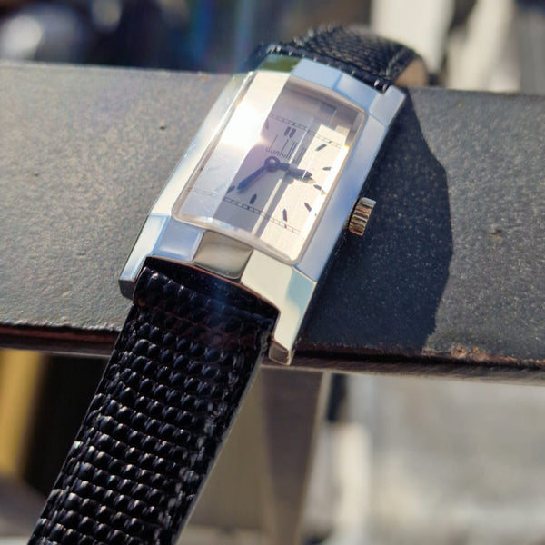 1990s Alfred Dunhill 'Facet' swiss Mechanical Wristwatch with silvered Dial on leather + Buckle & Box