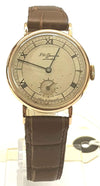 JW Benson & Smiths in solid 9ct Gold. a Dress Watch made in England dated 1950