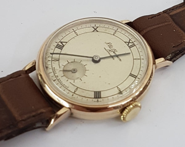 JW Benson & Smiths in solid 9ct Gold. a Dress Watch made in England dated 1950