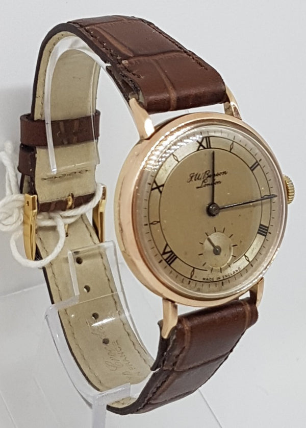 JW Benson & Smiths in solid 9ct Gold. a Dress Watch made in England dated 1950